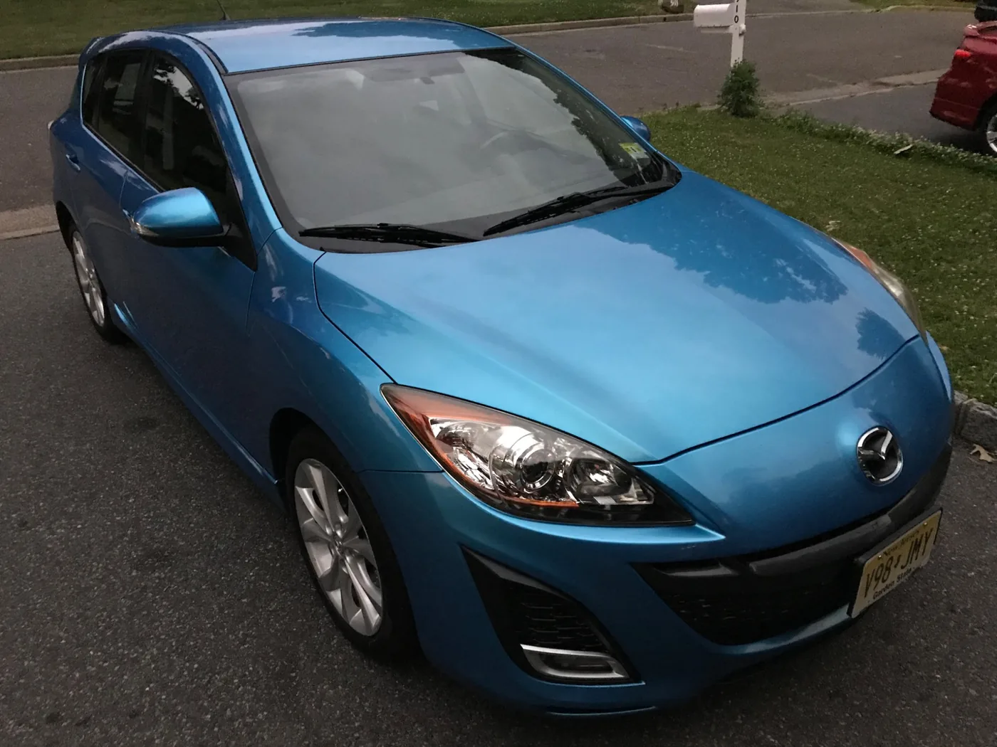 Blue Mazda after detailing