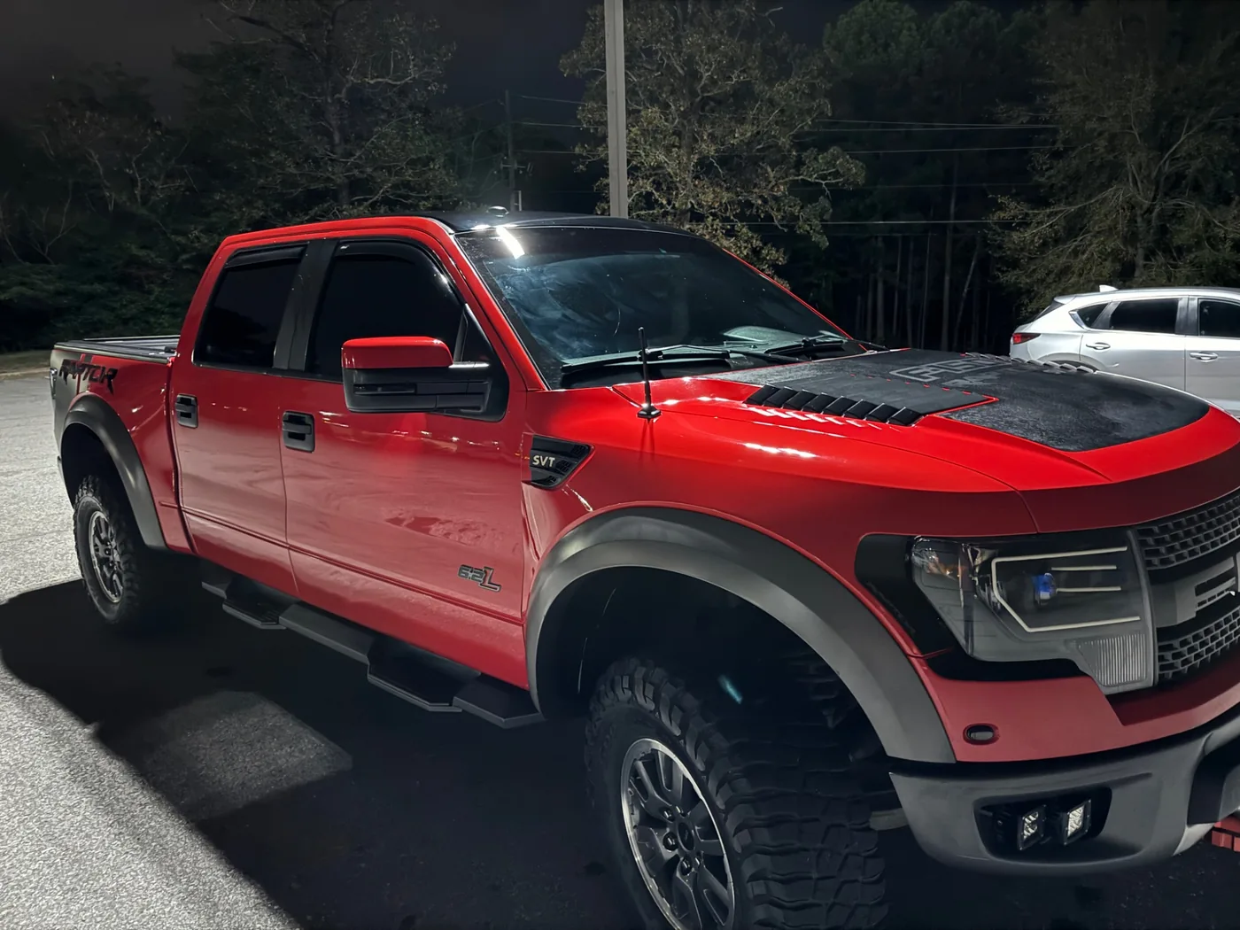 Red Ford Raptor after exterior detailing