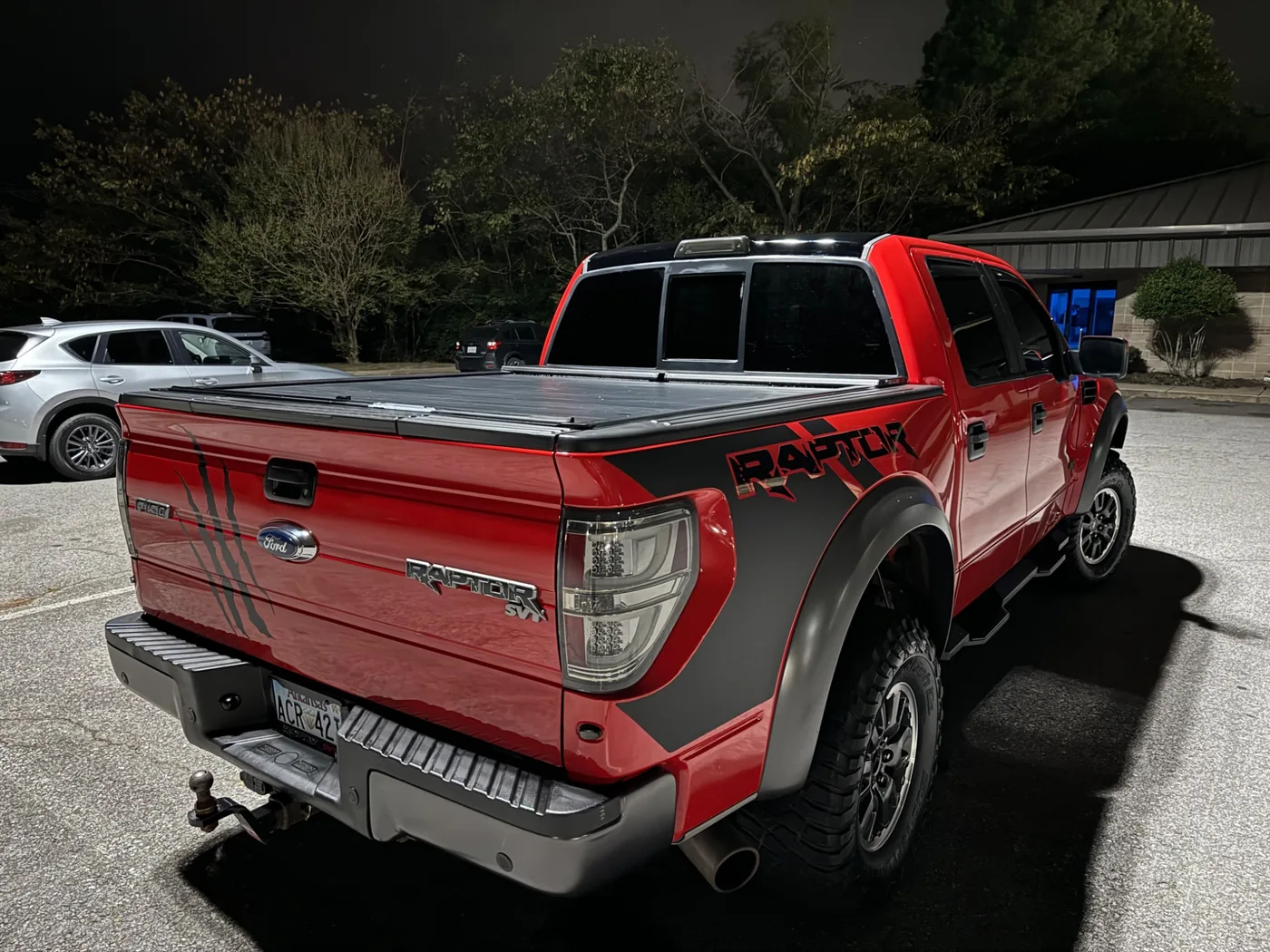 Rear view of red Ford Raptor